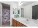 Bathroom with single vanity and shower/tub combo at 794 E Christopher St, San Tan Valley, AZ 85140