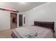 Bright bedroom featuring a double bed and spacious closet at 794 E Christopher St, San Tan Valley, AZ 85140