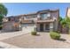 Two-story house with double garage and landscaping at 794 E Christopher St, San Tan Valley, AZ 85140