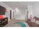 Upstairs loft area with TV, couch, and access to bedrooms at 794 E Christopher St, San Tan Valley, AZ 85140