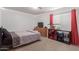 Simple bedroom with a double bed and built-in shelving at 794 E Christopher St, San Tan Valley, AZ 85140