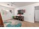bedroom with TV, toy storage, and ample floor space at 794 E Christopher St, San Tan Valley, AZ 85140
