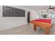Game room features a pool table and wet bar at 794 E Christopher St, San Tan Valley, AZ 85140