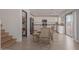 Kitchen boasts white cabinets and an island at 794 E Christopher St, San Tan Valley, AZ 85140