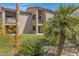 Building exterior showcasing private patio and landscaping at 9450 N 95Th St # 211, Scottsdale, AZ 85258