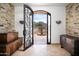 Open entryway with stone walls and mountain views at 40740 N Longhorn Dr, Scottsdale, AZ 85262