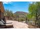 A relaxing pool and patio area with mountain views at 40740 N Longhorn Dr, Scottsdale, AZ 85262