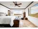 Serene bedroom with mountain views and rustic wooden accents at 40740 N Longhorn Dr, Scottsdale, AZ 85262