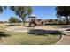 Community playground with playset and sand area at 4727 W Maldonado Rd, Laveen, AZ 85339