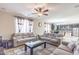 Bright living room with neutral colored couches and a coffee table at 4724 W Lydia Ln, Laveen, AZ 85339