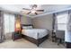 Cozy bedroom with a queen bed and built-in storage at 4724 W Lydia Ln, Laveen, AZ 85339