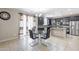 Kitchen dining area with glass table and four black chairs at 4724 W Lydia Ln, Laveen, AZ 85339