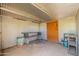 Workshop with shelving and ample storage space at 860 Yaqui Dr, Wickenburg, AZ 85390