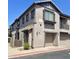 Two-story townhome with attached garage and neutral facade at 1250 S Rialto -- # 47, Mesa, AZ 85209