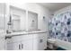 Bathroom boasts double sinks, granite countertops and a shower/tub combo at 14852 S Diablo Rd, Arizona City, AZ 85123