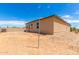 Newly built home with a large backyard and gravel landscaping at 14852 S Diablo Rd, Arizona City, AZ 85123