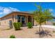 Newly built home with a small front yard and gravel landscaping at 14852 S Diablo Rd, Arizona City, AZ 85123