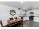 Modern kitchen with white cabinets and granite countertops at 14852 S Diablo Rd, Arizona City, AZ 85123