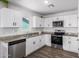 Modern kitchen with white cabinets and granite countertops at 14852 S Diablo Rd, Arizona City, AZ 85123