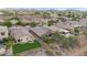 Aerial view showcasing a neighborhood with mountain views at 43154 N Outer Banks Dr, Anthem, AZ 85086