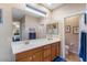 Double vanity bathroom with separate toilet area at 43154 N Outer Banks Dr, Anthem, AZ 85086