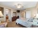 Large bedroom with king-size bed and ensuite bathroom at 43154 N Outer Banks Dr, Anthem, AZ 85086