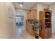 Bright hallway with built-in cabinetry and view of living area at 43154 N Outer Banks Dr, Anthem, AZ 85086