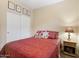 Relaxing bedroom with a cozy bed and plenty of closet space at 43154 N Outer Banks Dr, Anthem, AZ 85086