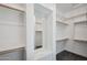 Large walk-in closet with ample shelving and hanging space at 13190 W Horsetail Trl, Peoria, AZ 85383