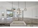 Modern kitchen island with farmhouse sink and stainless steel appliances at 13190 W Horsetail Trl, Peoria, AZ 85383
