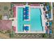 Community swimming pool with lounge chairs and shade structures at 13190 W Horsetail Trl, Peoria, AZ 85383