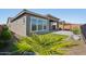 Artificial turf, landscaped area, and home exterior at 13190 W Horsetail Trl, Peoria, AZ 85383