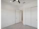 Bright bedroom with double door closet and wood-look floors at 13190 W Horsetail Trl, Peoria, AZ 85383
