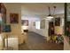 Bright hallway with wood floors and artwork on the walls at 3551 W Ross Ave, Glendale, AZ 85308