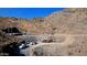 Aerial view of a construction site on a mountainside lot at 7150 N 40Th St # 11, Paradise Valley, AZ 85253