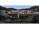 Luxury home with a long driveway, waterfall feature, and mountain views at 7150 N 40Th St # 11, Paradise Valley, AZ 85253