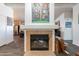 Cozy fireplace with a white surround and hearth at 3551 W Ross Ave, Glendale, AZ 85308