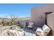 Private balcony with mountain views and comfortable seating at 8876 S Santa Elizabeth Dr, Goodyear, AZ 85338