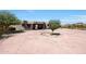 Landscaped front yard with circular driveway at 8876 S Santa Elizabeth Dr, Goodyear, AZ 85338