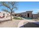 Spacious backyard with pool, patio, and lounging area at 8876 S Santa Elizabeth Dr, Goodyear, AZ 85338
