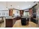 Modern kitchen features granite countertops and ample cabinet space at 8876 S Santa Elizabeth Dr, Goodyear, AZ 85338