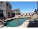 Relaxing pool area with waterfall feature at 8876 S Santa Elizabeth Dr, Goodyear, AZ 85338