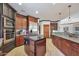 Spacious kitchen with island, stainless steel appliances, and ample cabinetry at 8876 S Santa Elizabeth Dr, Goodyear, AZ 85338