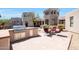 Relaxing patio with seating area and views of the surrounding landscape at 8876 S Santa Elizabeth Dr, Goodyear, AZ 85338