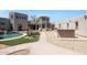 Private courtyard with pool, patio, and outdoor kitchen at 8876 S Santa Elizabeth Dr, Goodyear, AZ 85338