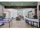 Game room with a bar, fireplace, and pinball machine at 8876 S Santa Elizabeth Dr, Goodyear, AZ 85338