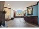 Large bathroom with soaking tub, double vanity, and fireplace at 8876 S Santa Elizabeth Dr, Goodyear, AZ 85338