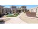 Private courtyard with pool, patio, and outdoor kitchen at 8876 S Santa Elizabeth Dr, Goodyear, AZ 85338