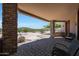 Covered patio with seating and mountain views at 8876 S Santa Elizabeth Dr, Goodyear, AZ 85338