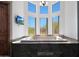 Luxurious bathroom with a large soaking tub, and scenic views at 8876 S Santa Elizabeth Dr, Goodyear, AZ 85338